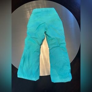 Girls north face snow pants size 7/8. Aqua blue. Excellent condition.